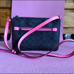 Cross body Coach brown and pink.  Like New.